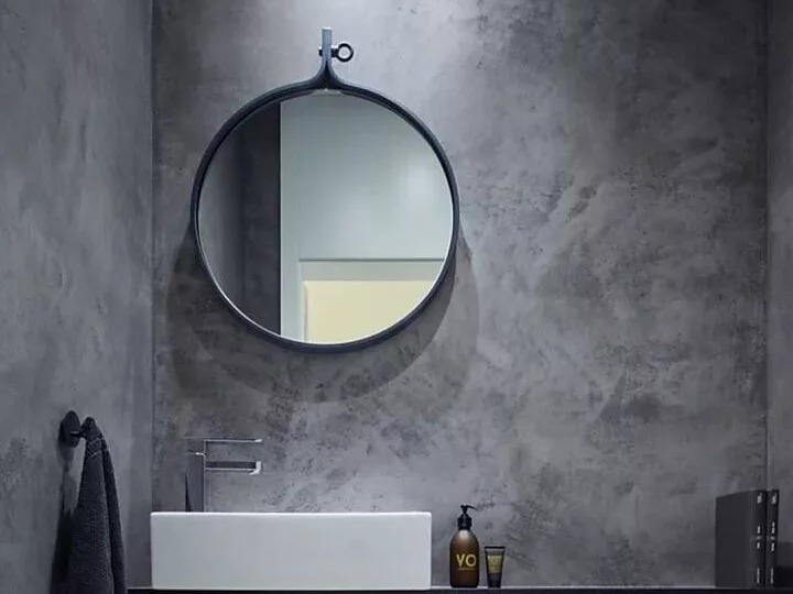 Beton ciré glad, spiegelgladde afwerking met curved arch